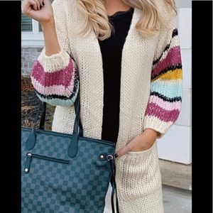 Rainbow sleeve sweater.